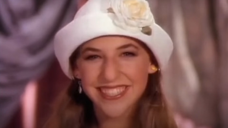 Blossom smiling in white hat