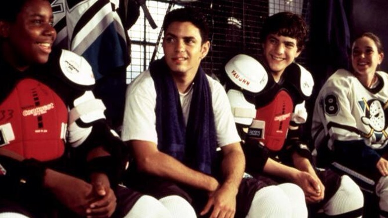 Luis sits in the locker room