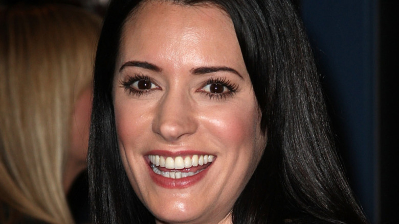 Paget Brewster smiling at a premiere