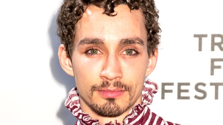 Robert Sheehan wearing stripes