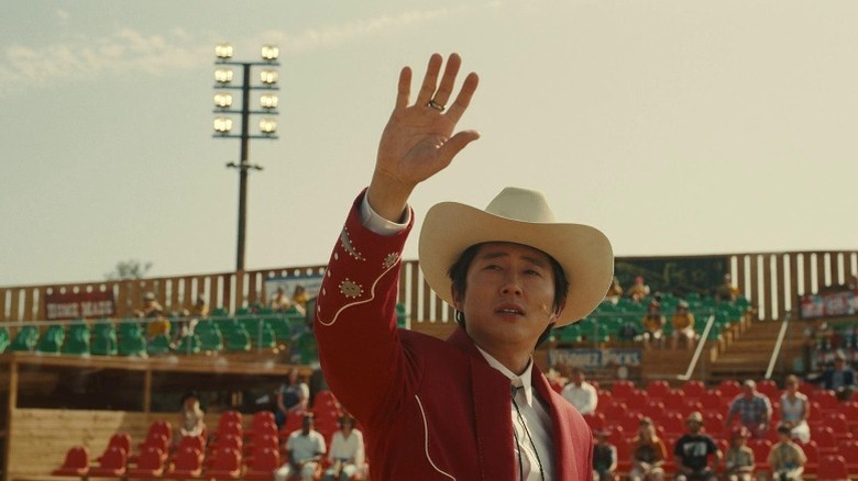Ricky "Jupe" Park holding up his hand while looking at the sky
