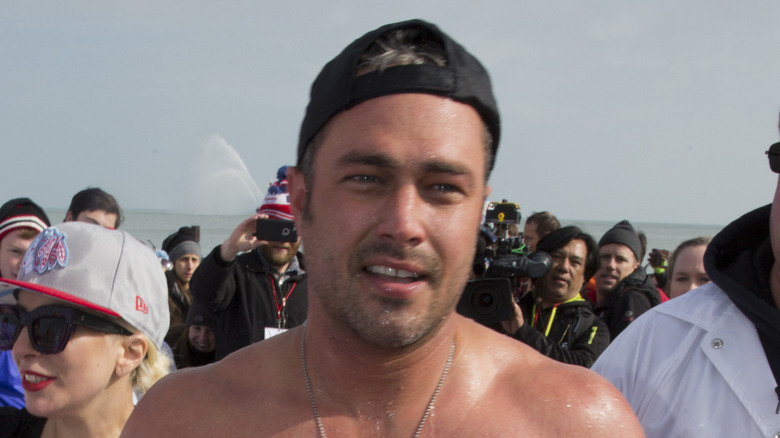 Taylor Kinney on beach