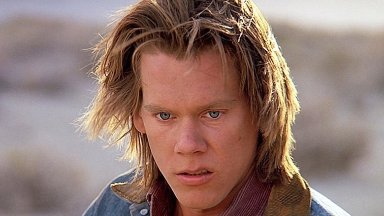 Kevin Bacon grimacing in Tremors