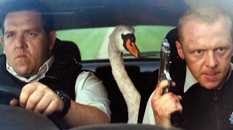 Danny, Nicholas Angel, and a swan driving in "Hot Fuzz" (2007)