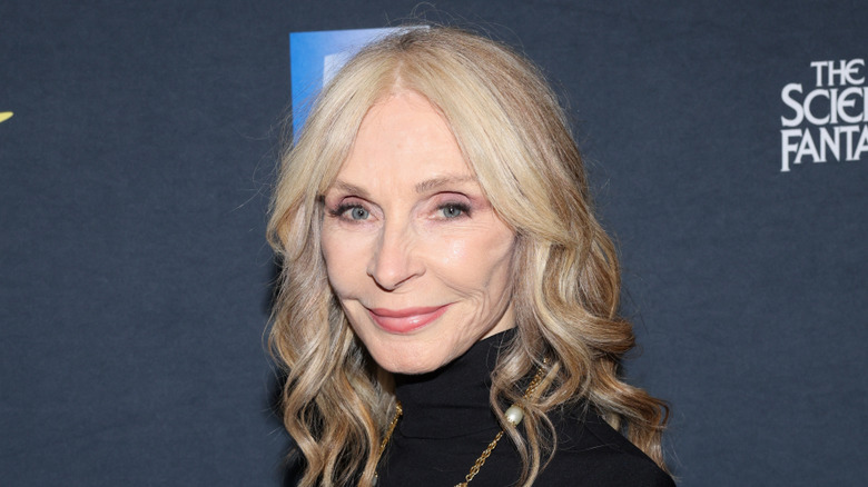 Gates McFadden wearing black and smiling