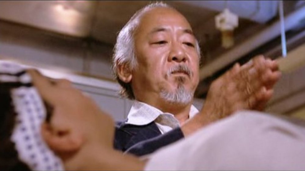 Pat Morita as Mr. Miyagi and Ralph Macchio as Daniel LaRusso in The Karate Kid