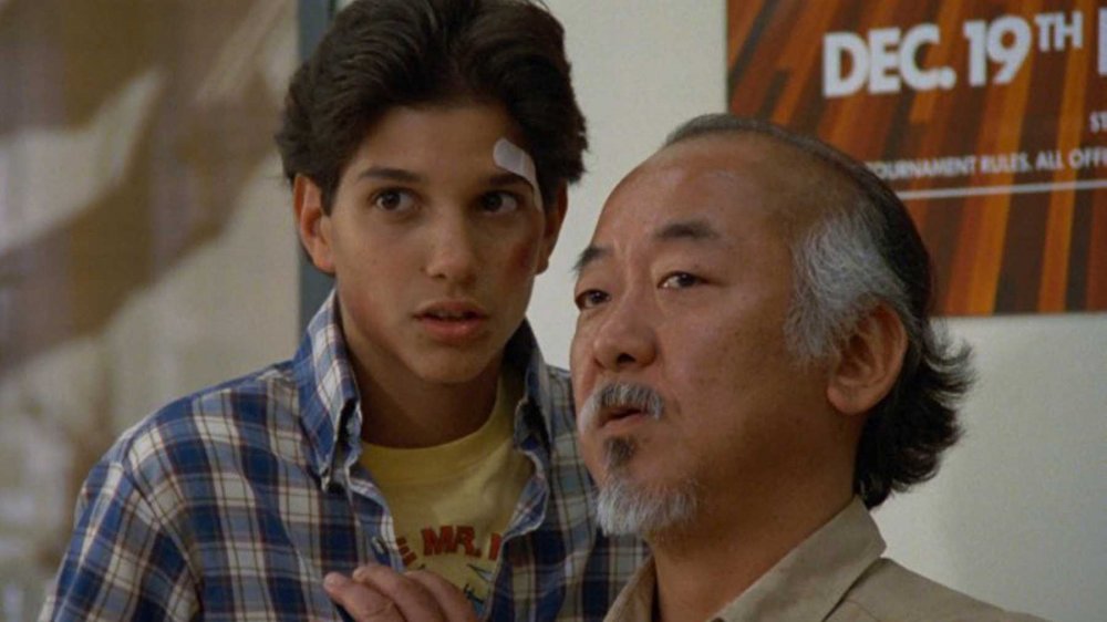 Pat Morita as Mr. Miyagi and Ralph Macchio as Daniel LaRusso in The Karate Kid