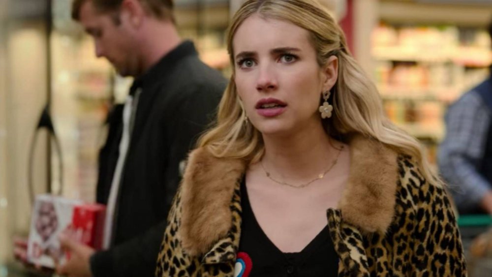 Emma Roberts and an extra who looks like Ryan Gosling star in Netflix's Holidate
