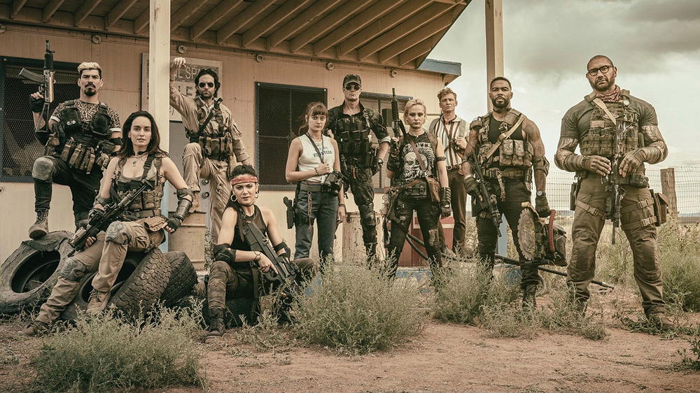 Cast of Army of the Dead armed with weapons