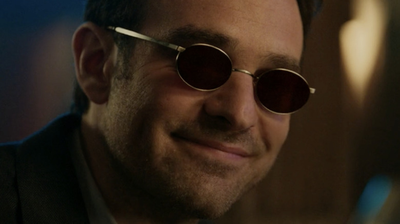 Matt Murdock wearing glasses with red lenses