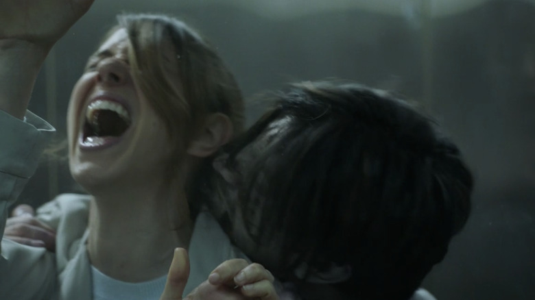 Lyla Belshaw being attacked by a walker