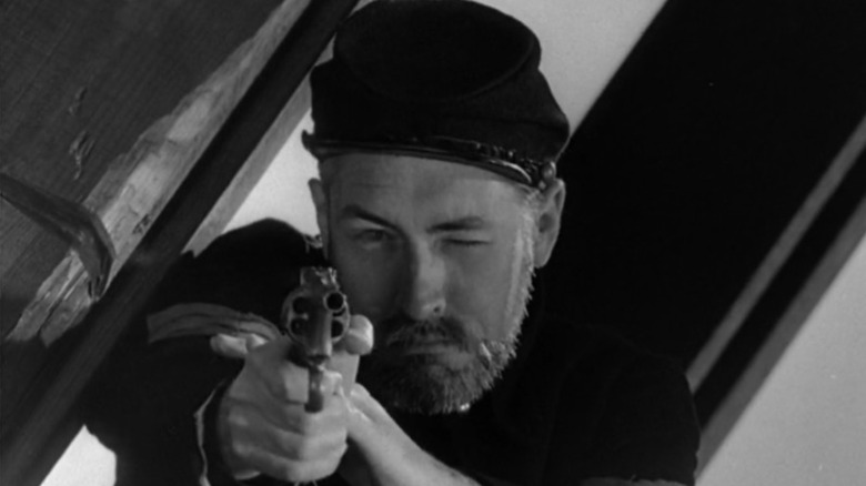 A soldier points his gun directly into the camera lens in "An Occurrence At Owl Creek Bridge" (1964)