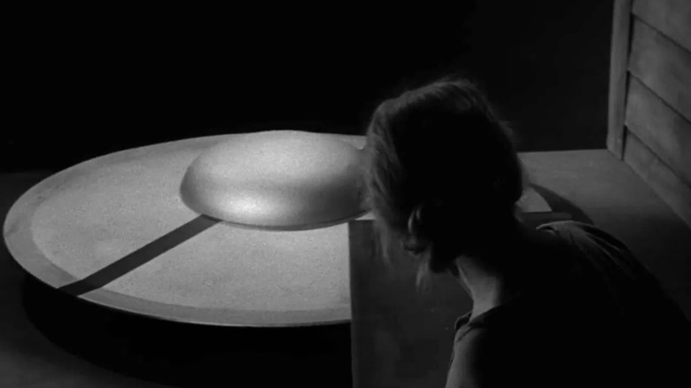 Woman investigates a space ship on The Twilight Zone (1959-1964)