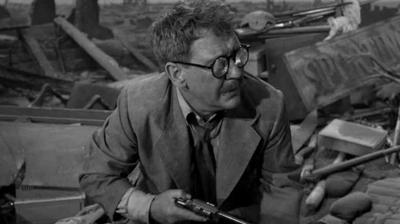 Henry Bemis struggles with a gun on The Twilight Zone (1959-1964)