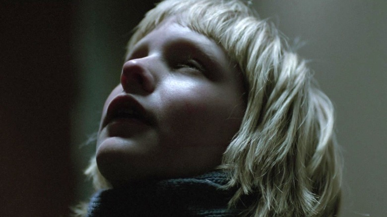 Oskar closing his eyes in Let the Right One In