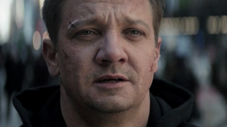 Jeremy Renner with bandages across his face