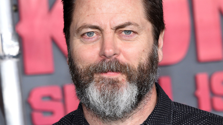 Offerman smiling at the camera