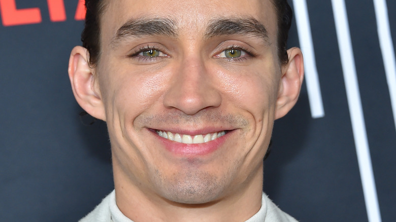 Robert Sheehan smiling