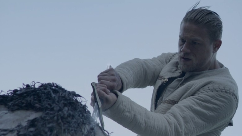 Arthur pulling sword from stone