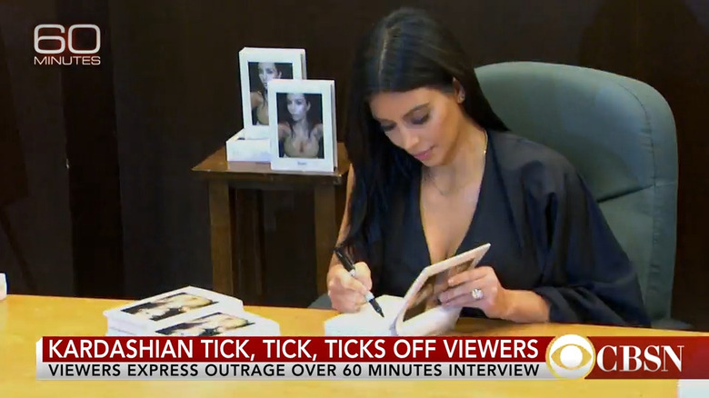 Kim Kardashian signing books