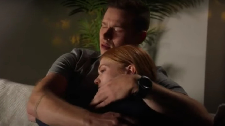 Buck embracing Taylor