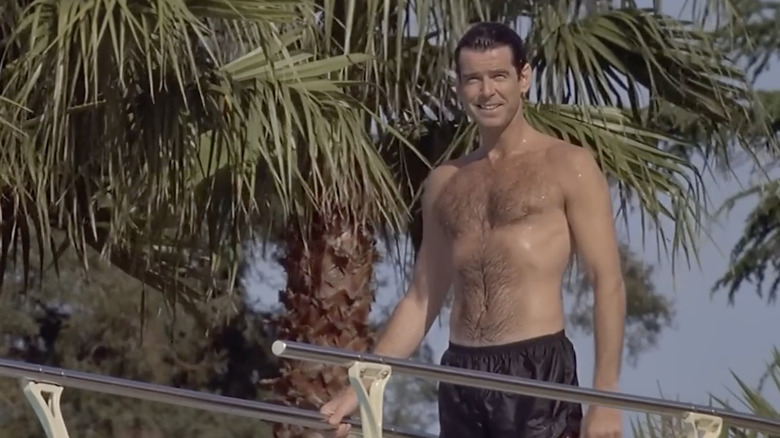 Stu Dunmeyer wearing a black bathing suit on a diving board