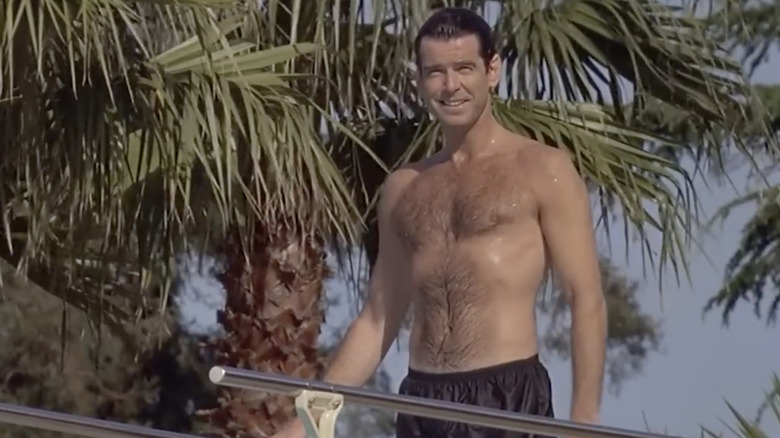 Stu Dunmeyer wearing a black bathing suit on a diving board