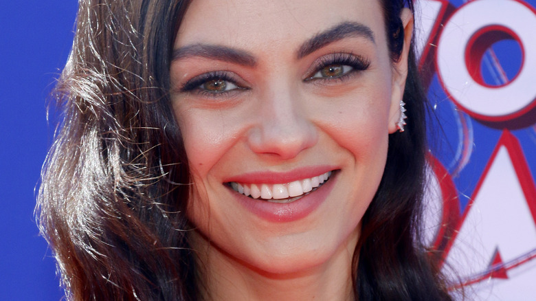 Mila Kunis smiling