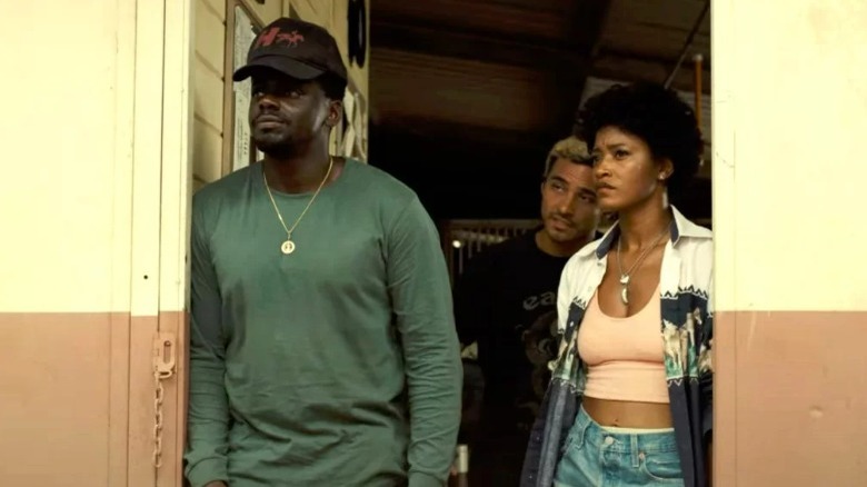 OJ and Emerald Haywood in a doorway