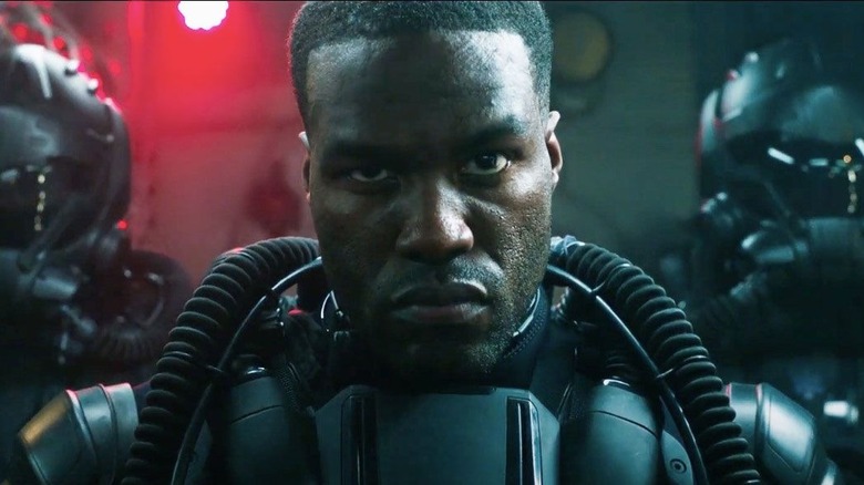 Black Manta glares
