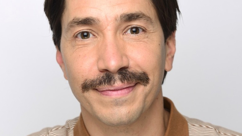 Justin Long with mustache