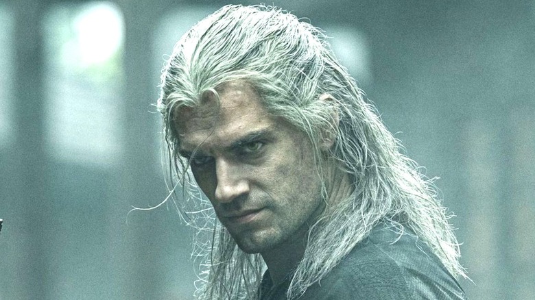 Henry Cavill scowling in The Witcher 