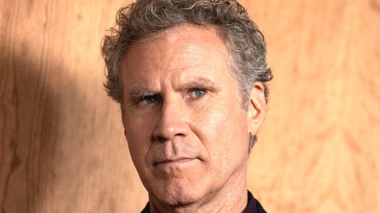 Will Ferrell with wooden background