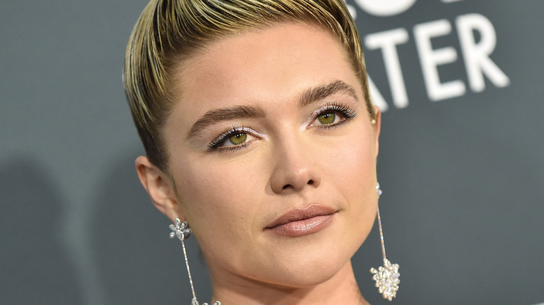 Florence Pugh looks serious