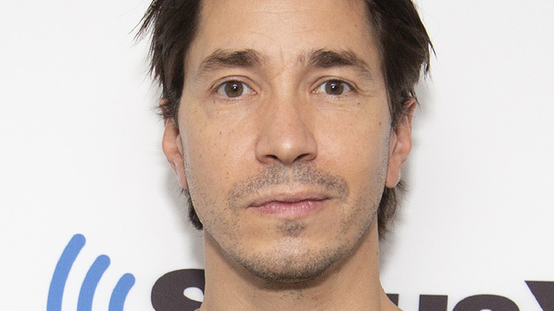 Justin Long smiling