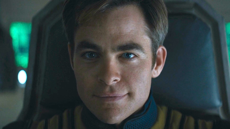 Chris Pine smirking as Captain Kirk