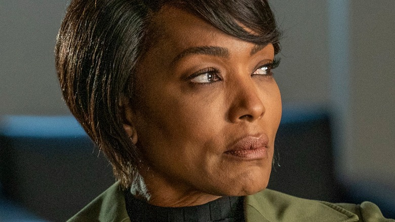 Angela Bassett on 9-1-1 looks  to her left