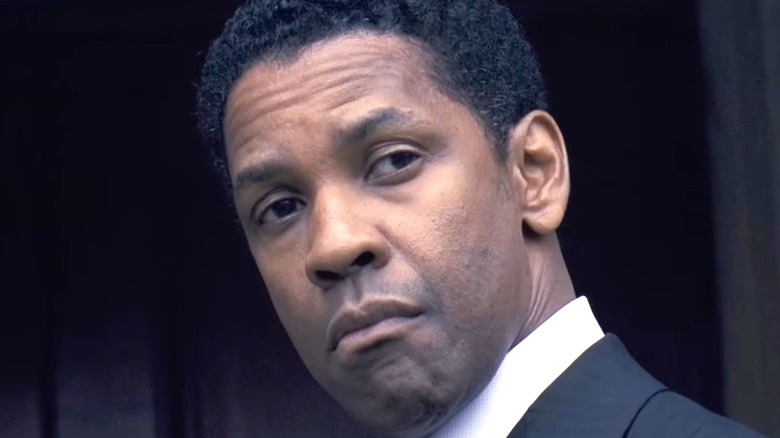 Denzel Washington scowls in a suit