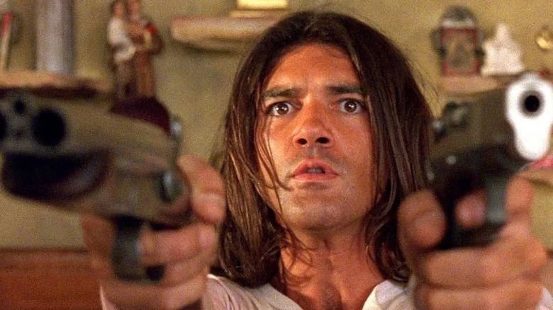 Banderas fires guns