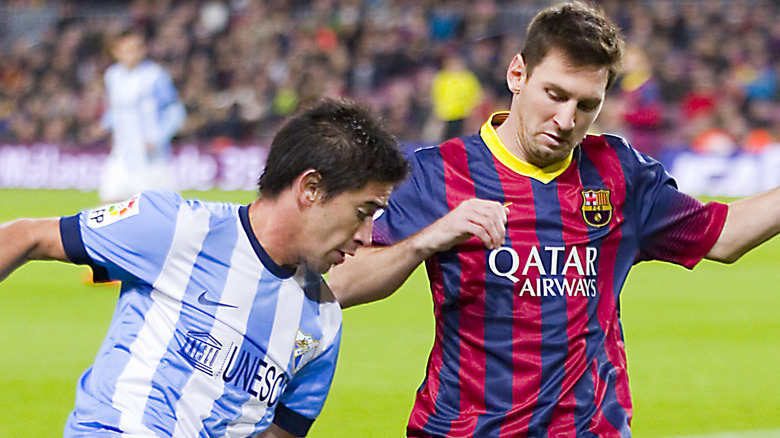 Malaga CF against Messi