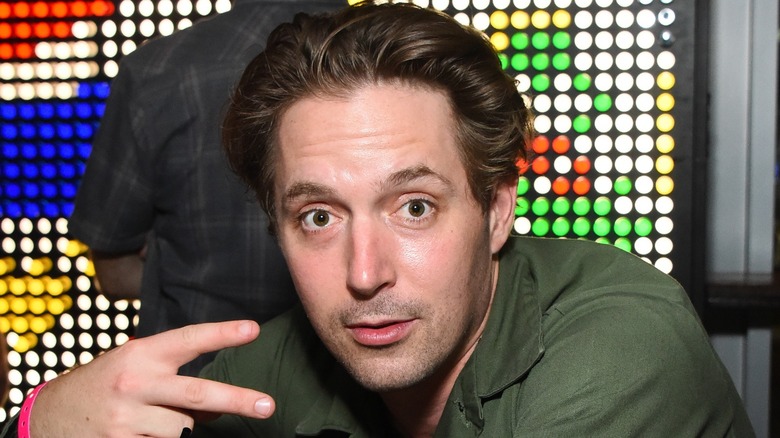 Beck Bennett posing