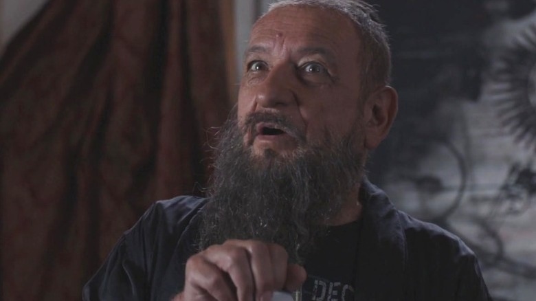 Trevor Slattery opening beer can