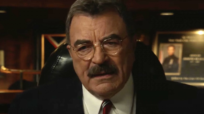 Tom Selleck as Frank Reagan on Blue Bloods looking displeased