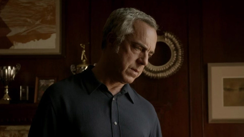 Bosch speaks to person at desk