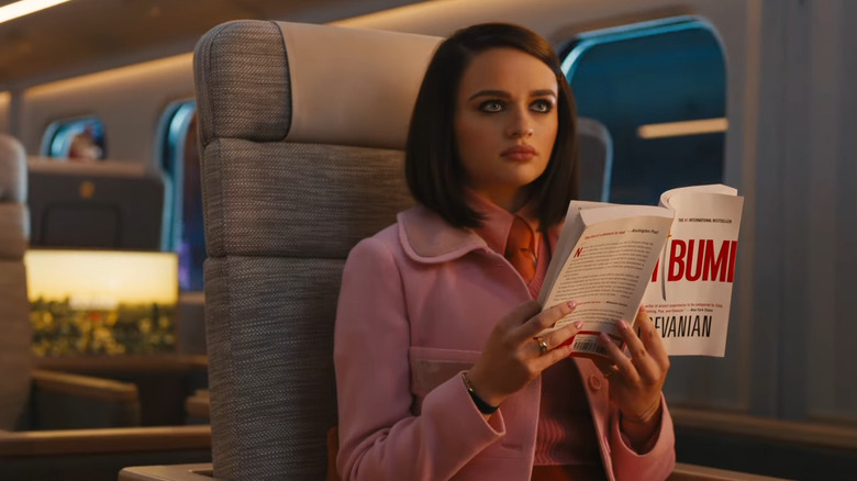 Joey King reading book on train in Bullet Train
