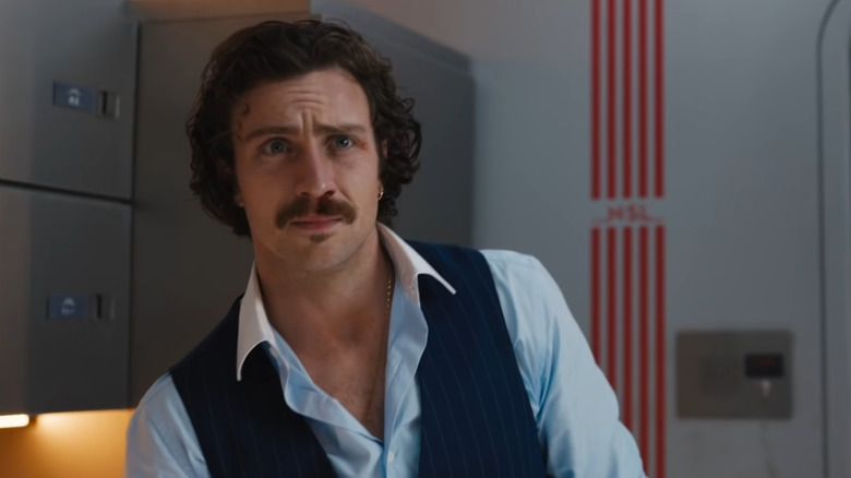 Aaron Taylor-Johnson looking confused in Bullet Train