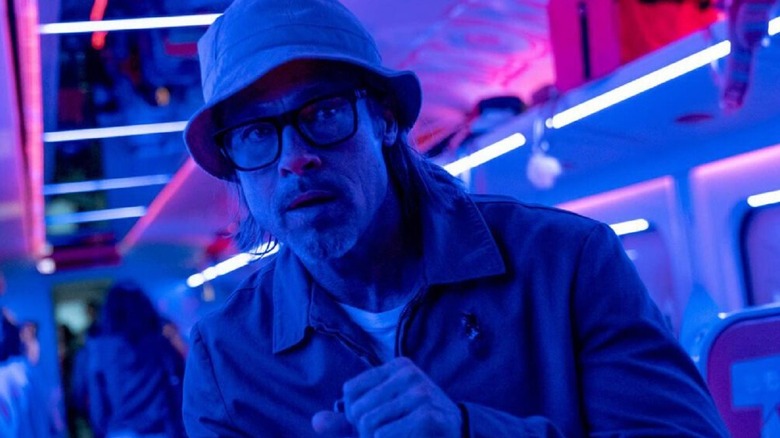 Brad Pitt looking stern in a bucket hat