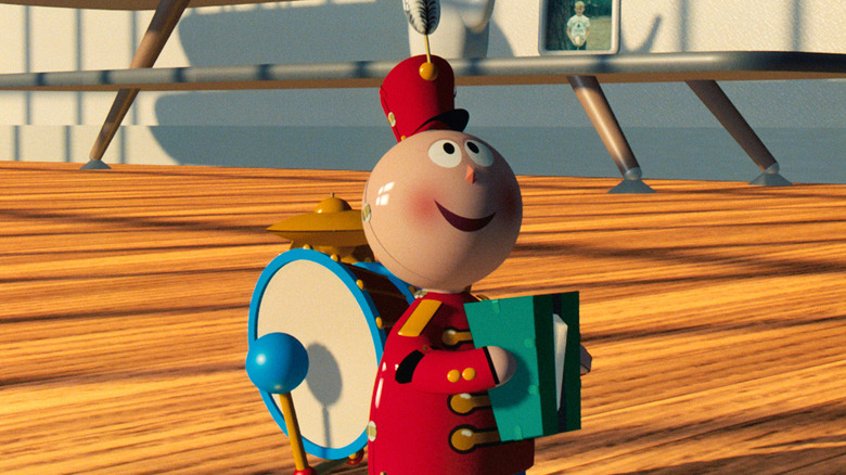 Animated wind-up toy character playing instruments