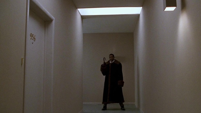 Tony Todd lingering in a hallway