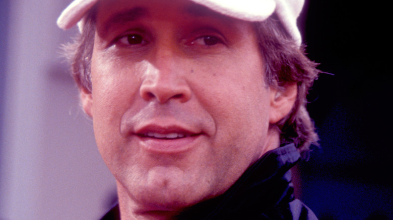 Younger Chevy Chase looks to side
